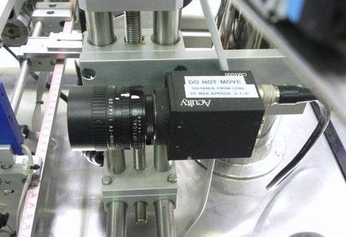 Neri Model SL400 Pressure Sensitive Wraparound Bottle Labeler