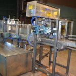 Combi Model DP200 Auto Drop Packer with Oscillating Infeed and E-2500 RH Case Erector