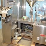 TGM Model B620AC 6,000 PPH Rotary Tube Filler and Fold and Roll/Hot Air Sealer