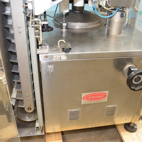 TGM Model B620AC 6,000 PPH Rotary Tube Filler and Fold and Roll/Hot Air Sealer