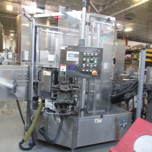 Krones Cold Glue Wrap Around Labeler with Infeed Air Knives and Domino DPX500 Laser Coder